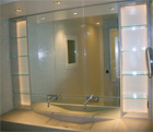 Armoire de salle de bain, 2 colonnes en béton ciré 3 portes miroirs.